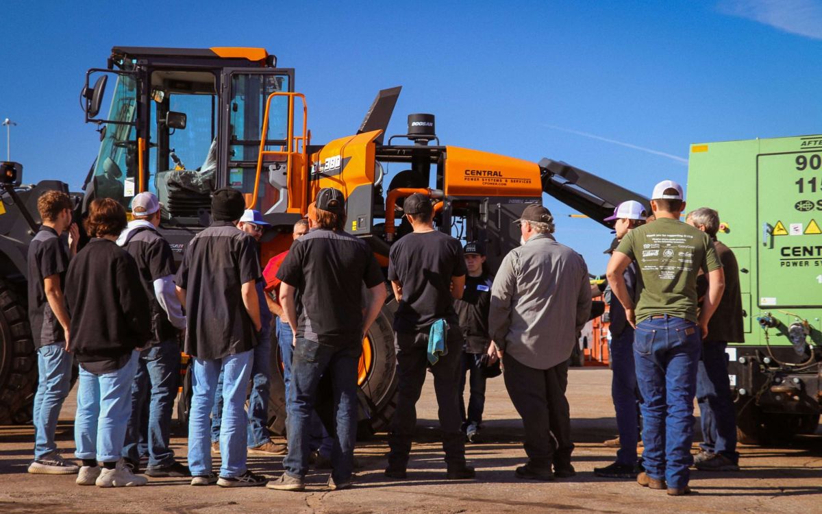 A picture of open house event at Central Power Systems & Services' Wichita location with multiple employees and customers.