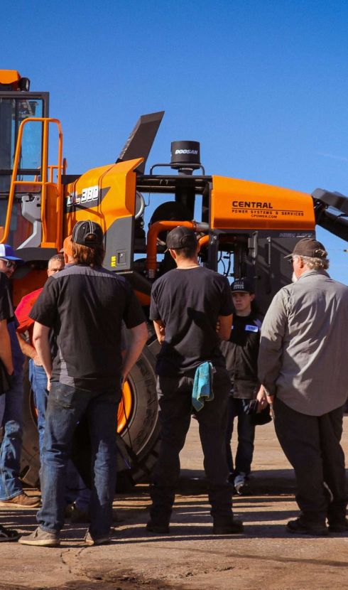 A picture of open house event at Central Power Systems & Services' Wichita location with multiple employees and customers.